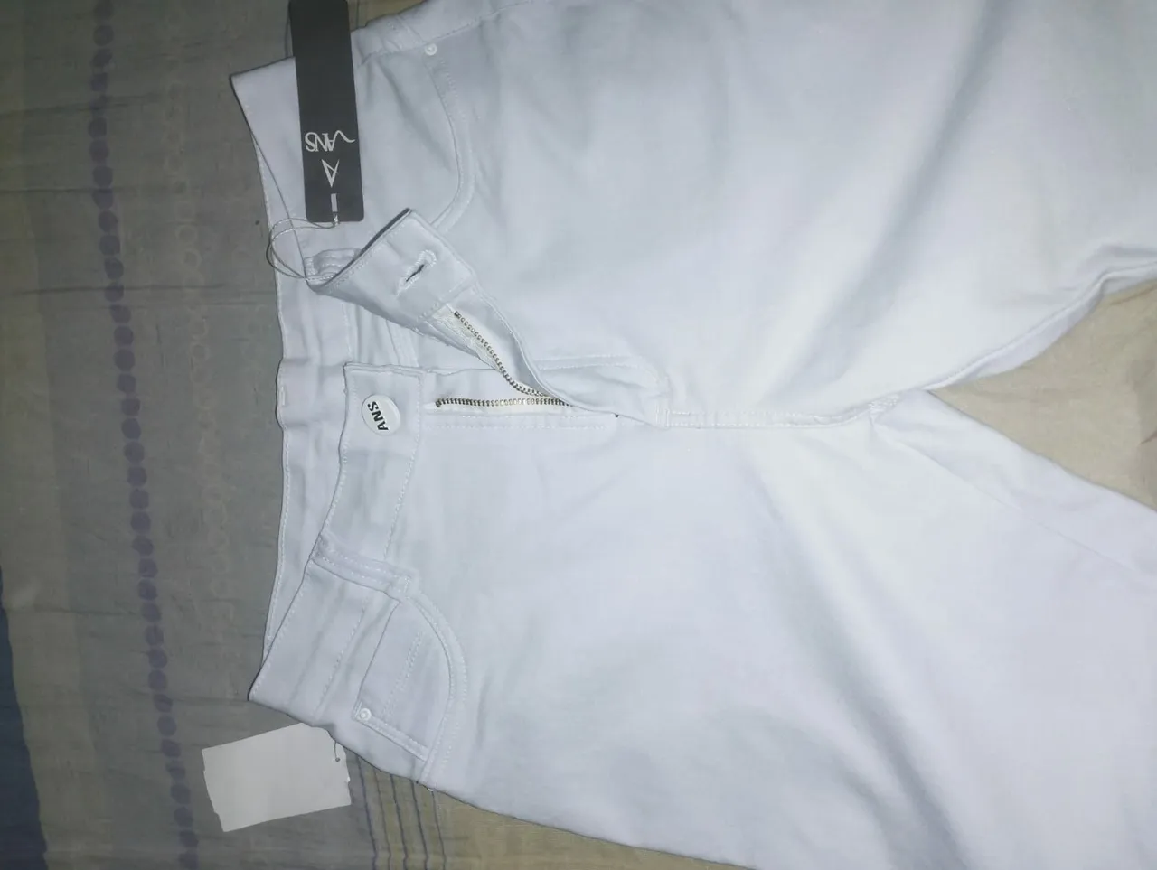 Calça jeans da cor branca