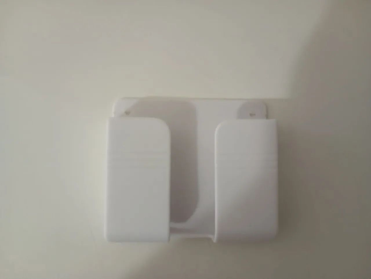 Suporte de Parede para o Celular 