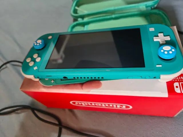 Nintendo Switch Lite Turquesa usado BLOQUEADO - Foto 3