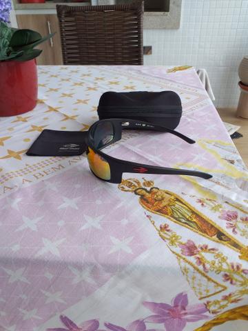 Vendo lindo oculos de sol Mormaii Acqua produto novo e original completo - Foto 2