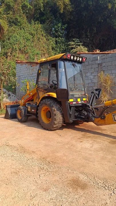 retroescavadeira randon