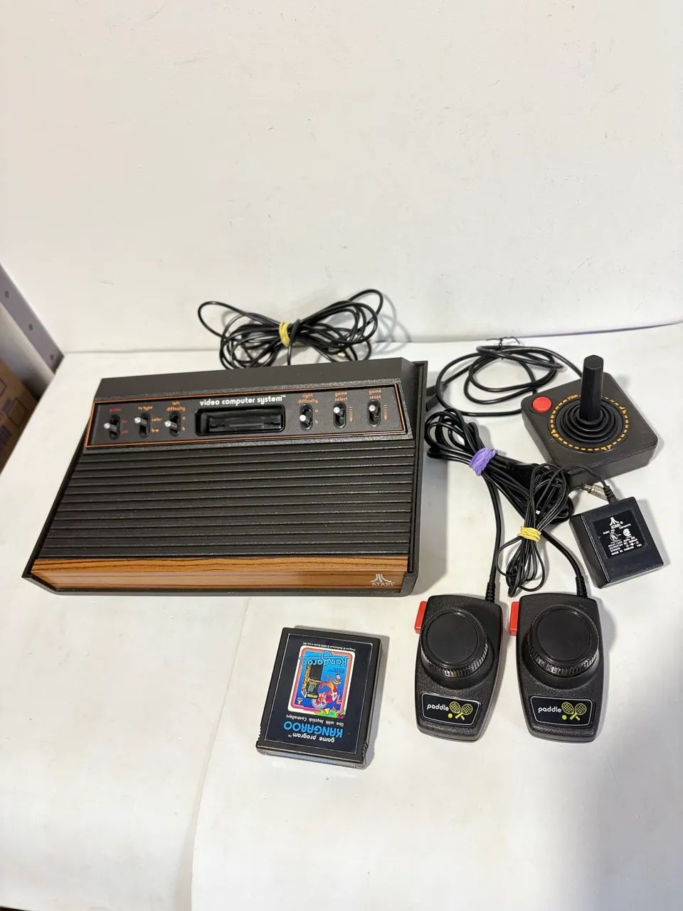 Console Atari 2600  sixier frente de madeira