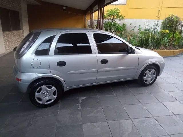 Chevrolet Corsa Hatch 1.4 Mpfi Maxx 8v Flex 4p Manual Dourado Flex 2012  Usado - Interior Carro