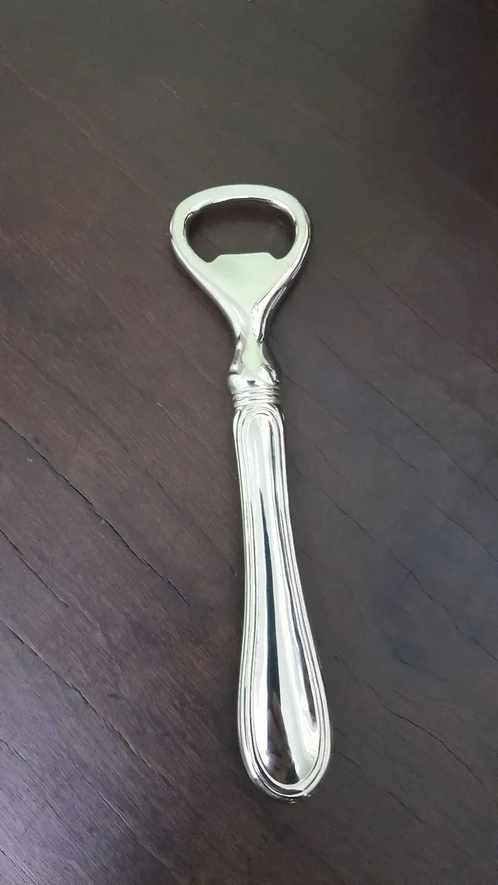 Antigo abridor de garrafas Italiano. 