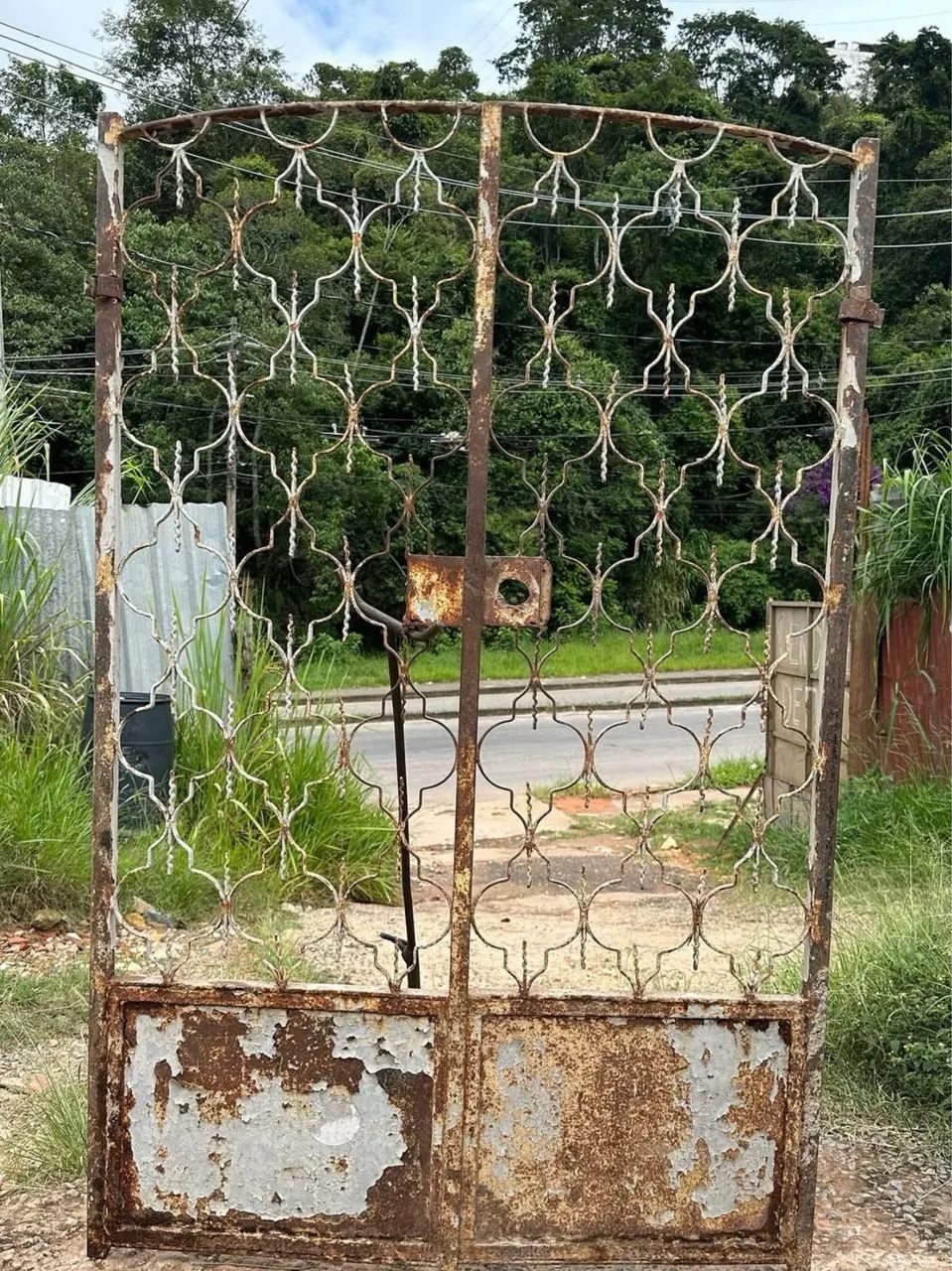 Ancient solid iron gate with two flags461932532219914242