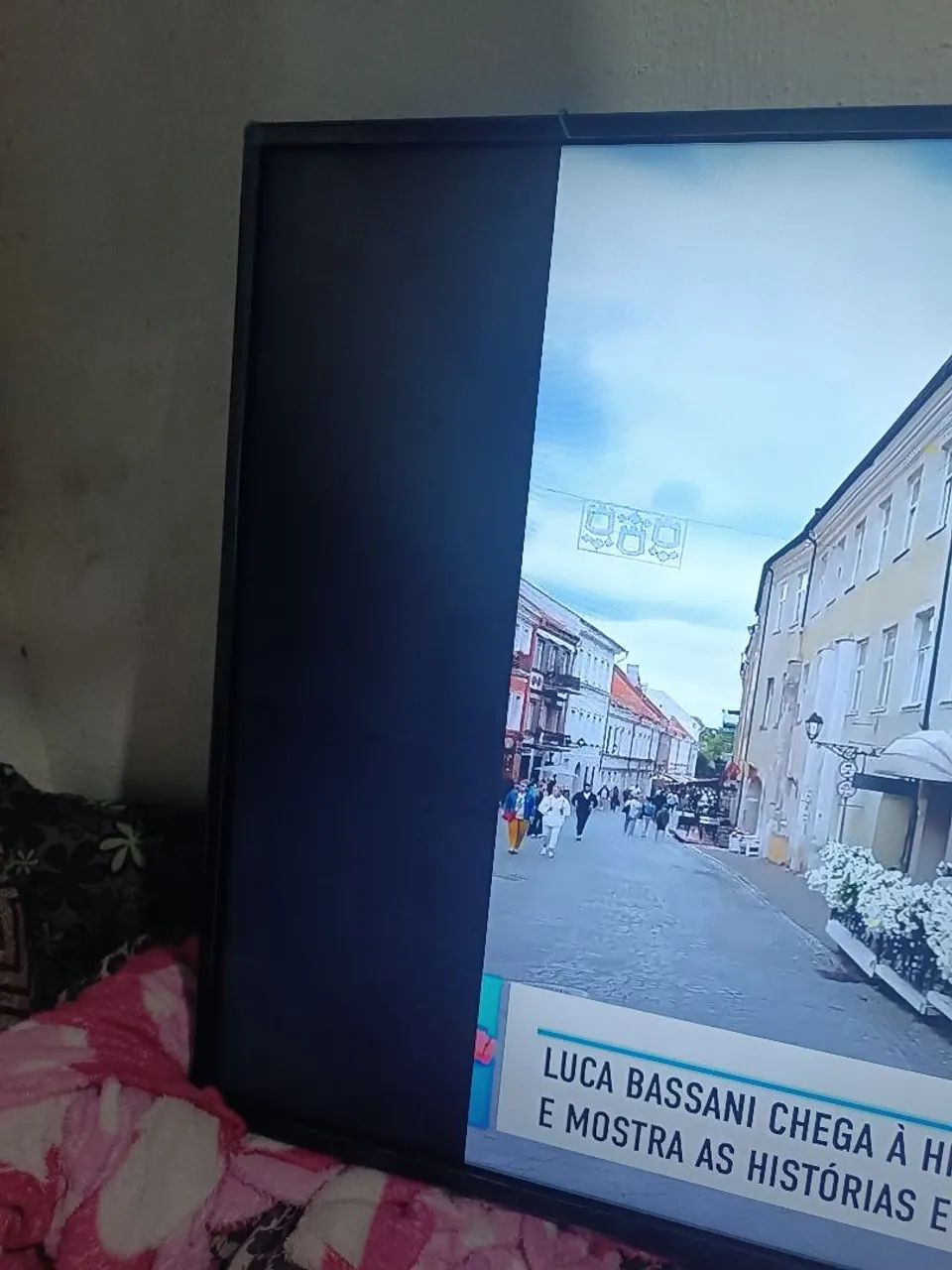 Vendo essa TV LG 55 polegadas com essa parte preta em um lado da  tela