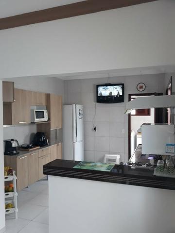 Casa 03 dorm, sendo 02 suite, 02 salas, garagem 04 autos, terreno de 250 mts. (financia)