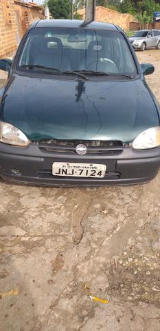 Vendo ou troco corsa emplacado - Foto 9