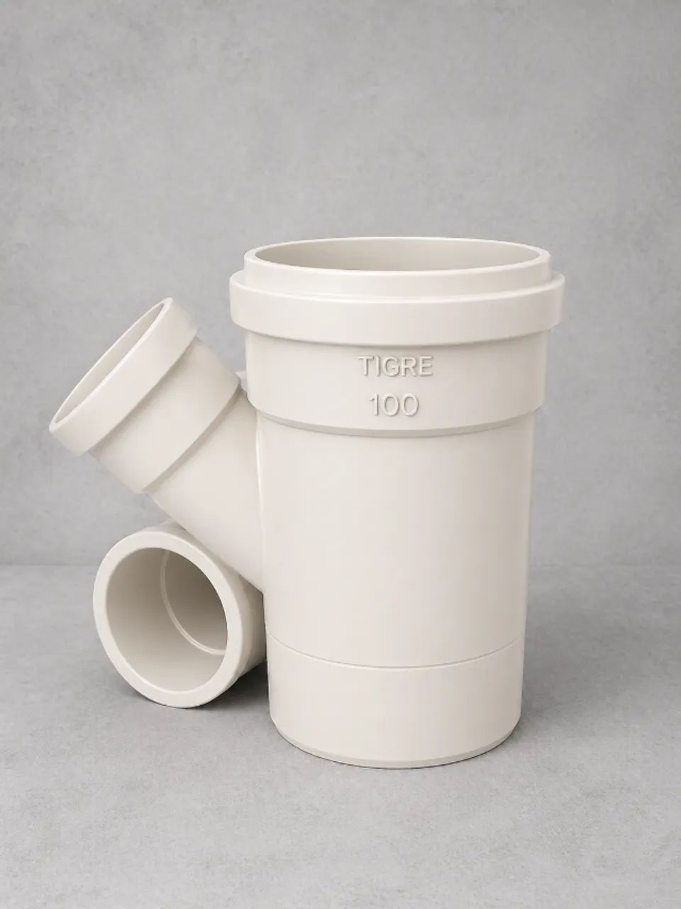 Conexão de Esgoto Tigre 100mm PVC | Joelho 45° com Entrada