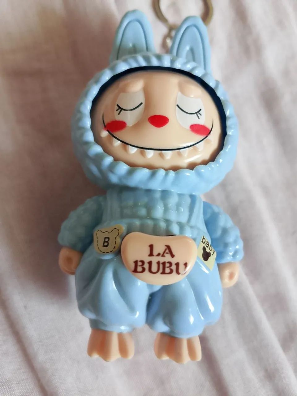 La bubu chaveiro com 3 carinhas 