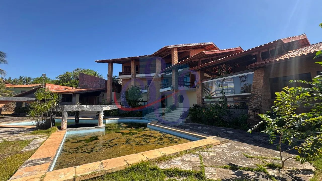 Ampla casa triplex com 6 suítes em Porto das Dunas!