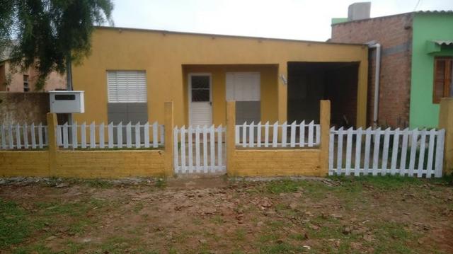 Terreno com 2 casas - R$ 120.000,00( Negociável)