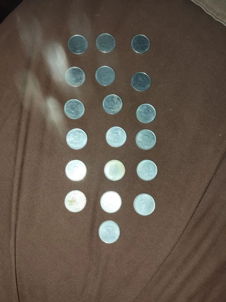 Conjunto de 19 moedas de 5 centavos com cunhagem entre 1994 e 1997