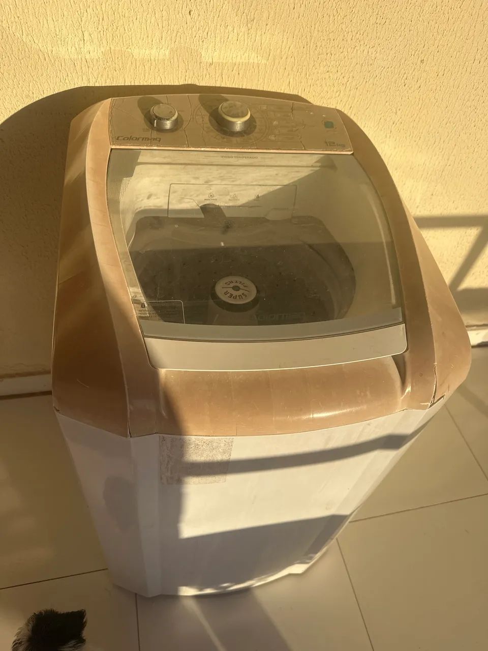 Máquina de lavar com defeito 