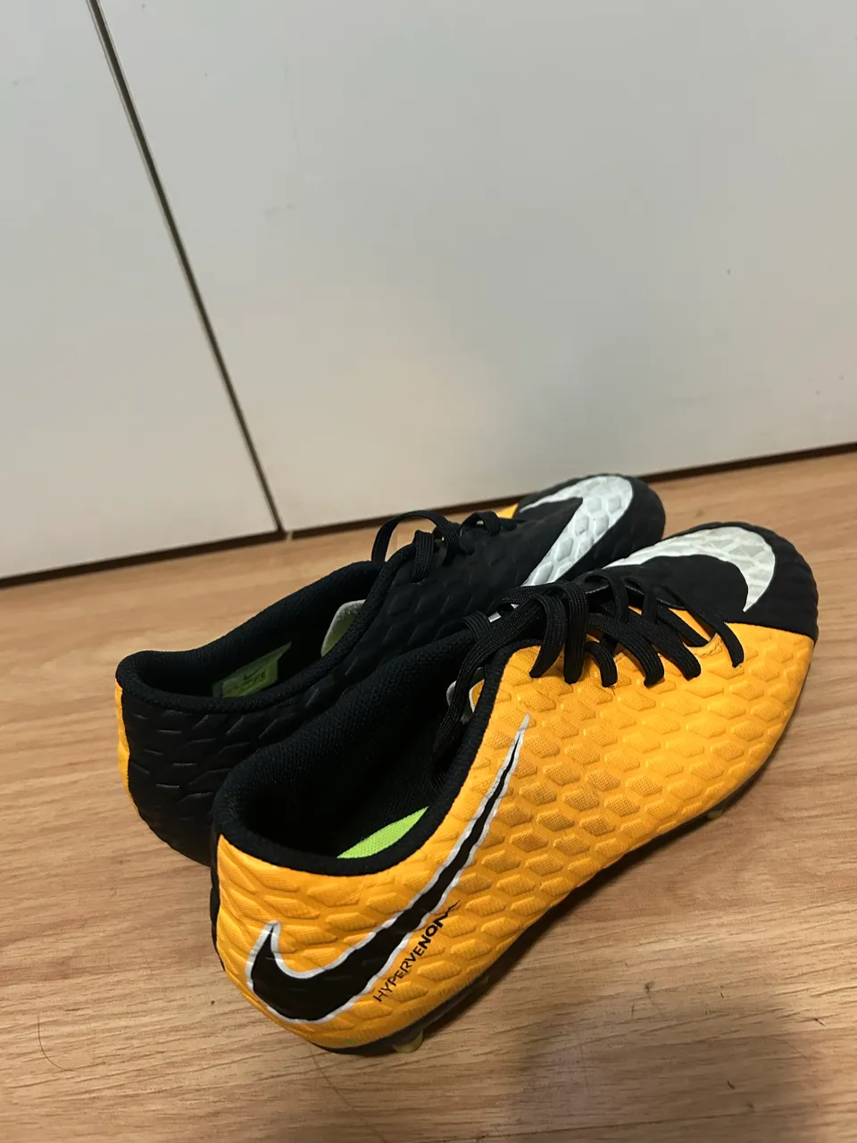 Chuteira campo cravo alto Nike mercurial - Calçados Esportivos