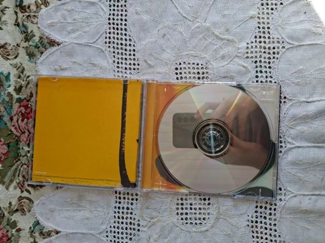 CD In Between Dreams do cantor Jack Johnson, lançado em 2005. - Foto 3