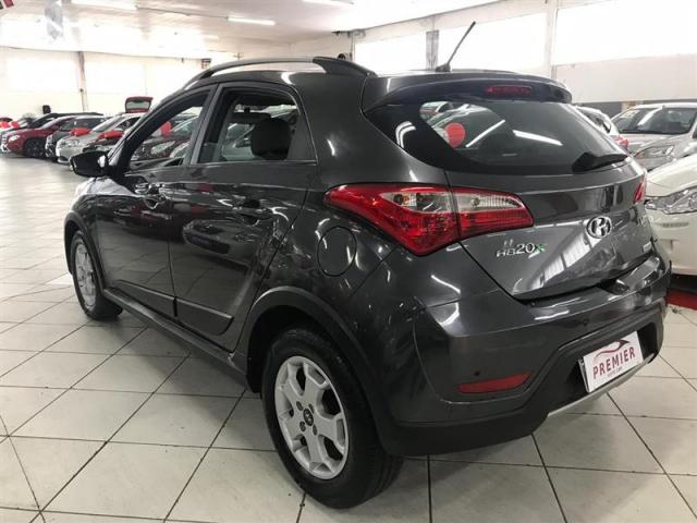 HYUNDAI HB20X 1.6 16V PREMIUM FLEX 4P AUTOMÁTICO - Foto 4