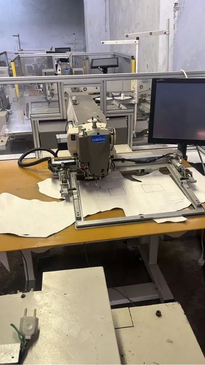 Máquina de costura programada