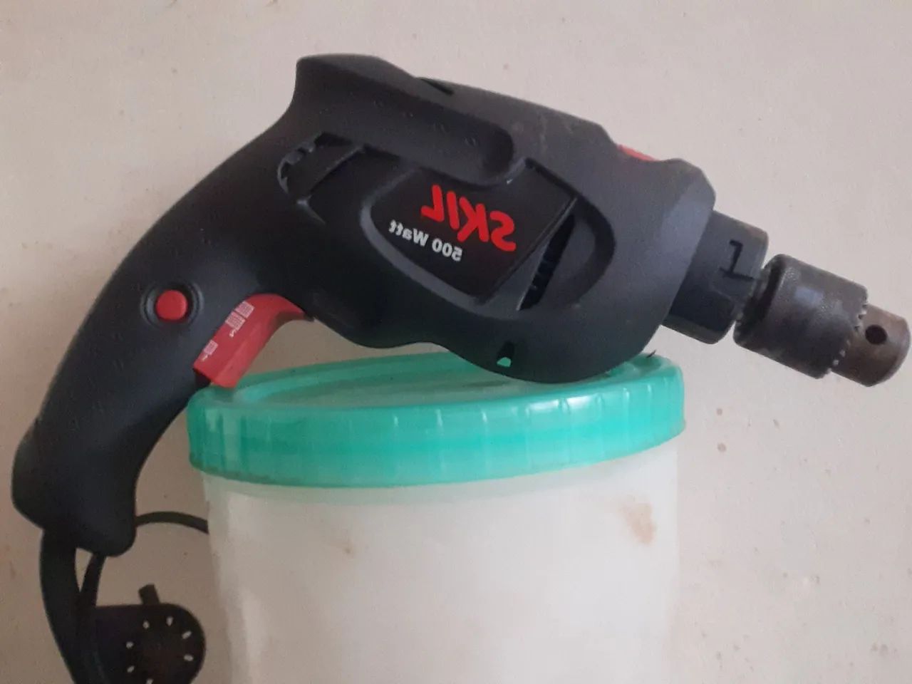 Furadeira skil 500w nova com botão contínuo e função martelete 