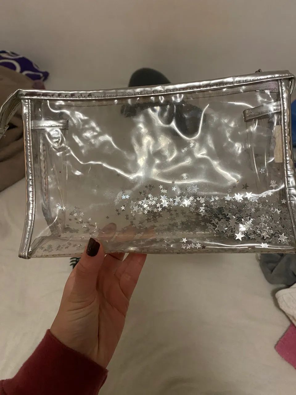 NECESSAIRE TRANSPARENTE COM ESTRELAS