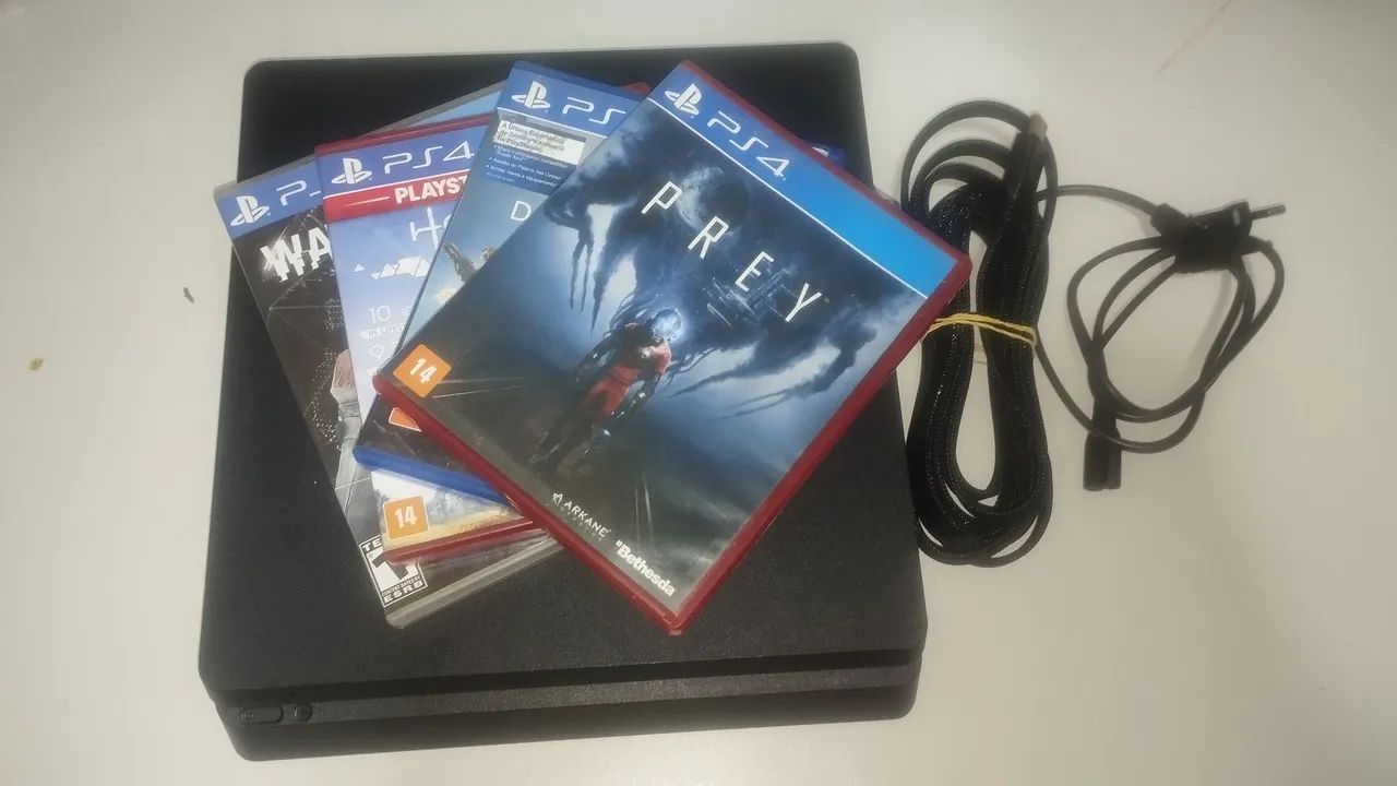 PS4 com caixa e jogos. - Foto 3
