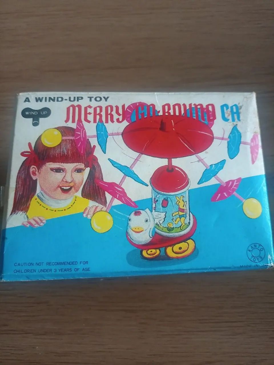Merry Go Round Car" (Carrinho Carrossel). 