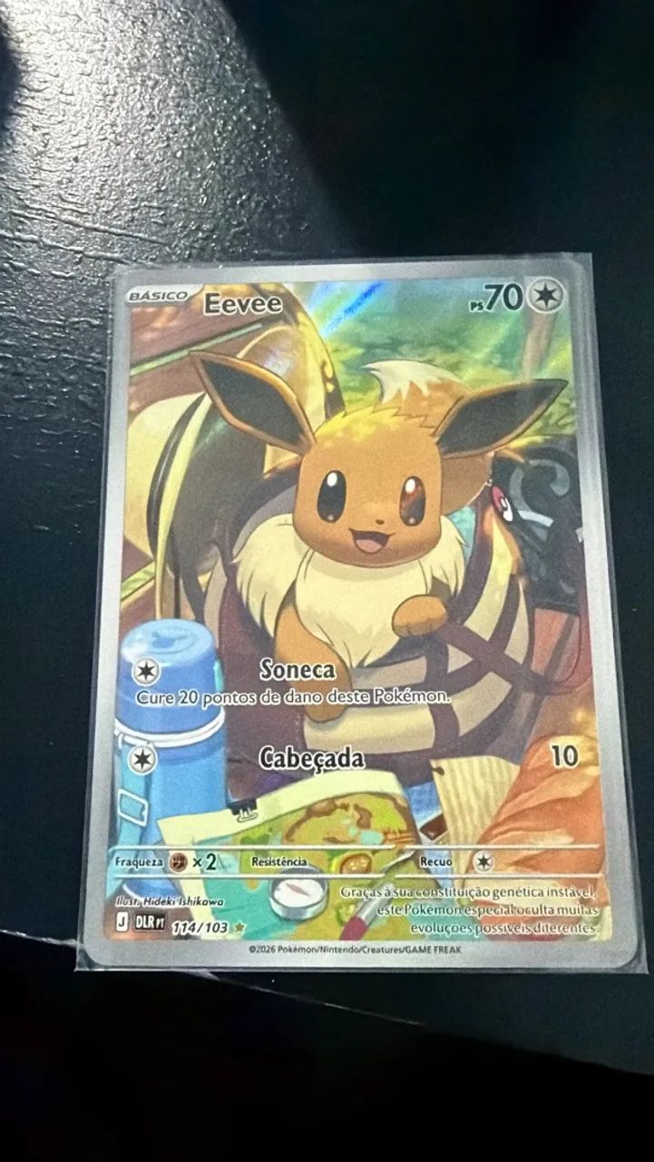 Eevee 114/103 Reinado Delta - Do booster pro toploader. 