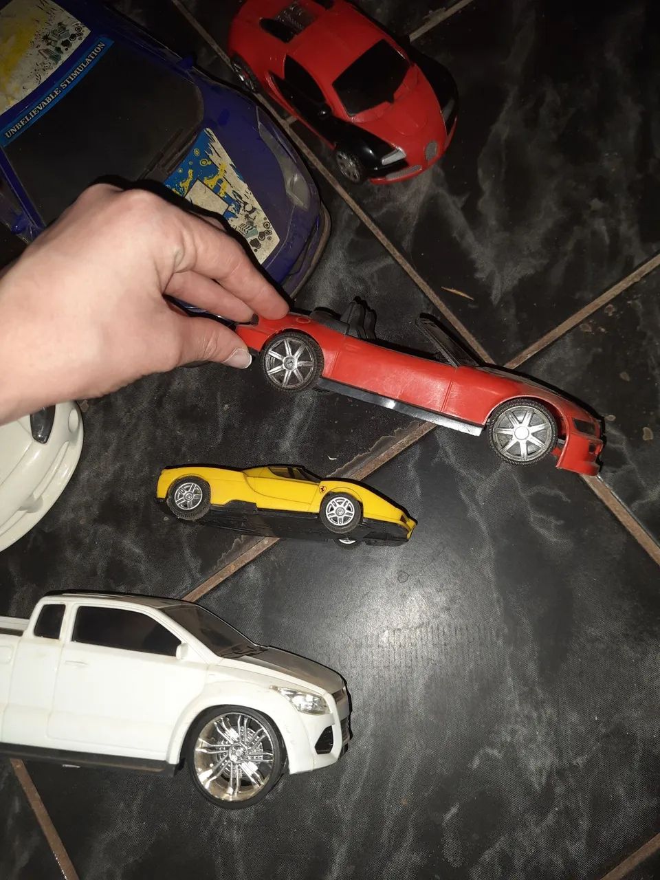 Kit com 8 carrinhos e um transformers  - Foto 5