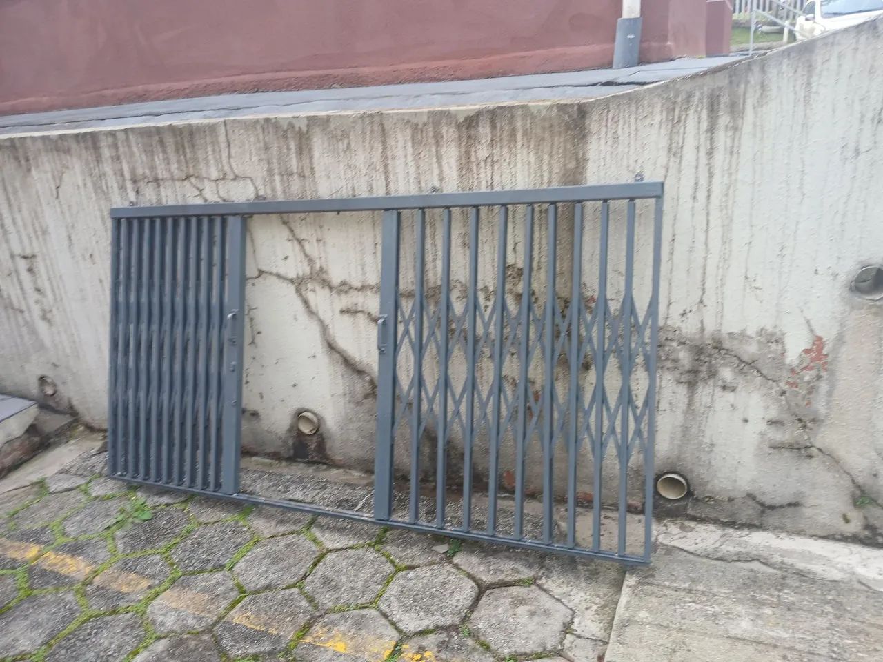 Grade pantografica para janela