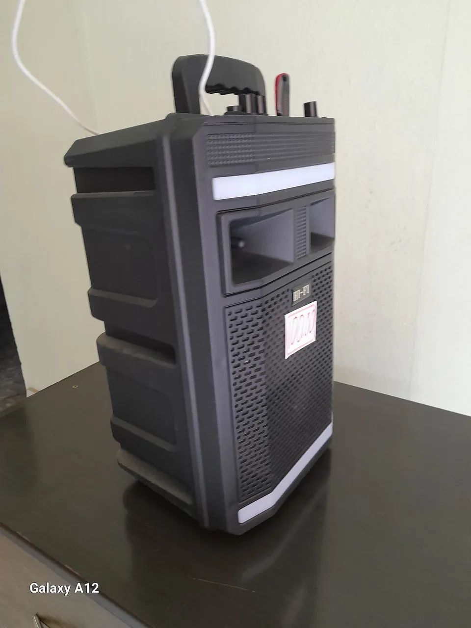 Caixinha com Bluetooth e karaoke com microfone.  - Foto 4