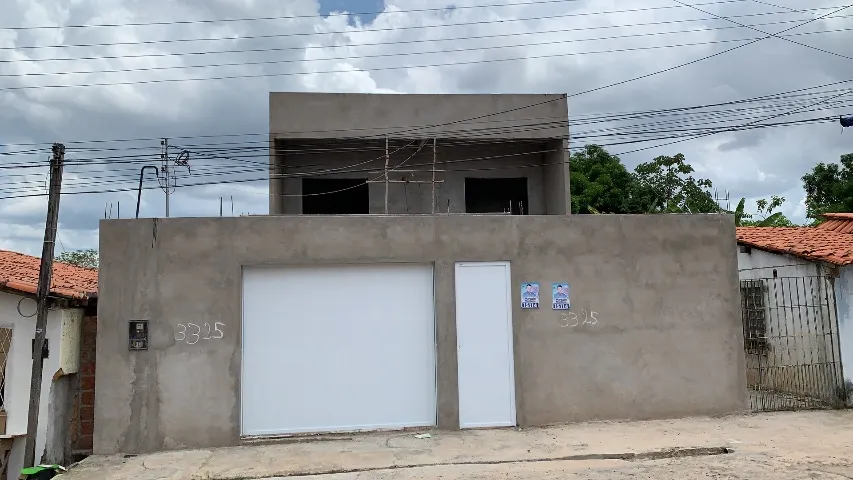 Terreno com Casa Inacabada