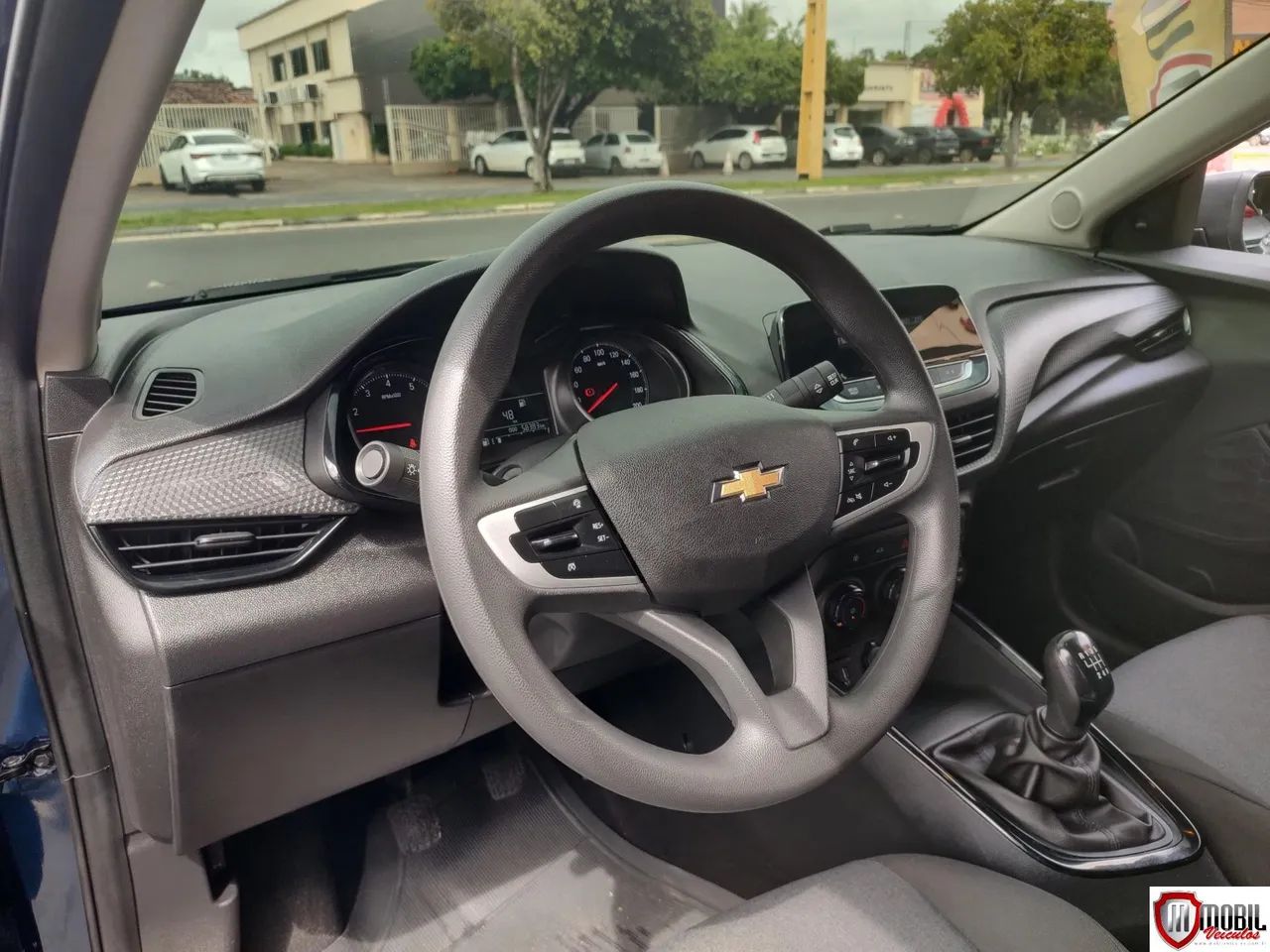 ONIX HATCH 1.0 12V FLEX 5P MEC. AZUL 2022/2023 - Foto 4