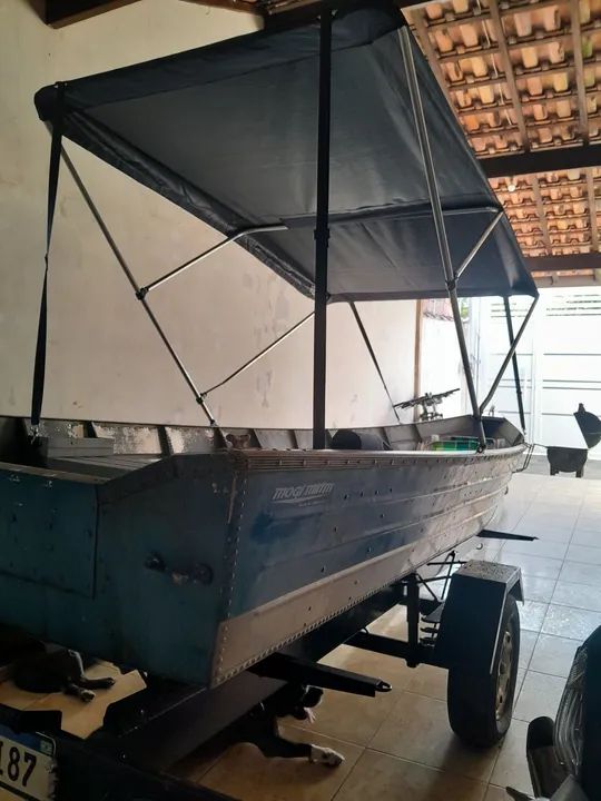Barco 5 metros carreta mais motor 15 hp toyma semi novo. - Foto 4