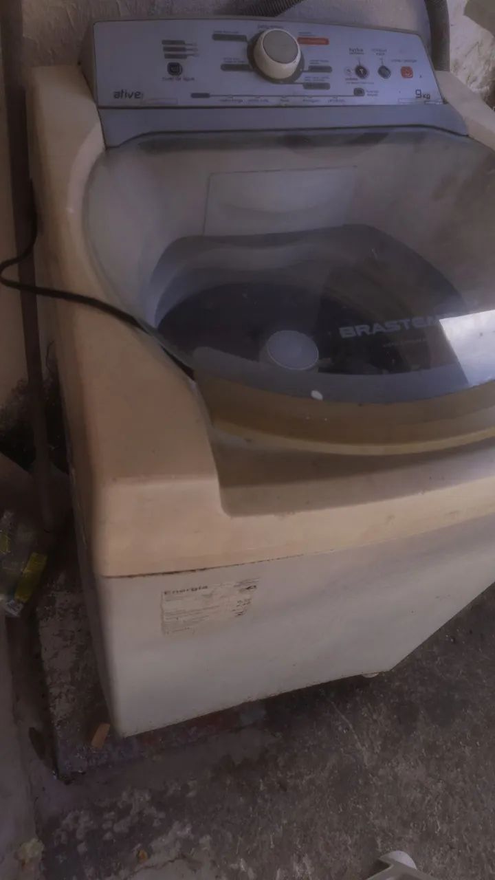Máquina de lavar com defeito 