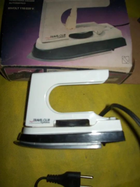 Ferro de passar roupa em viagem