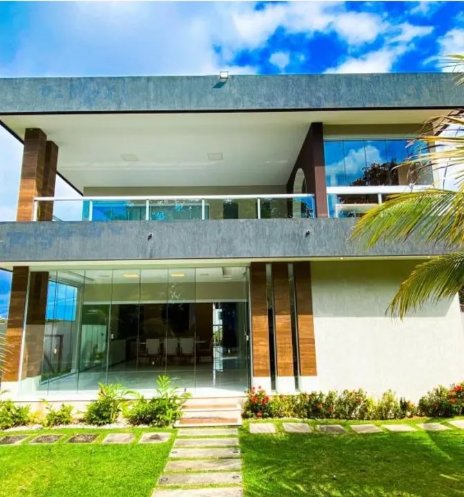Casa com 4/4 em Alphaville Litoral Norte disponível para locação .
