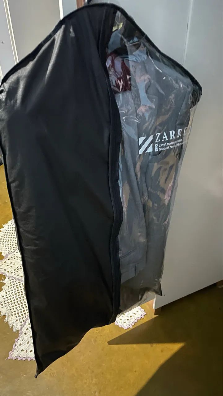 Vendo terno cinza usado