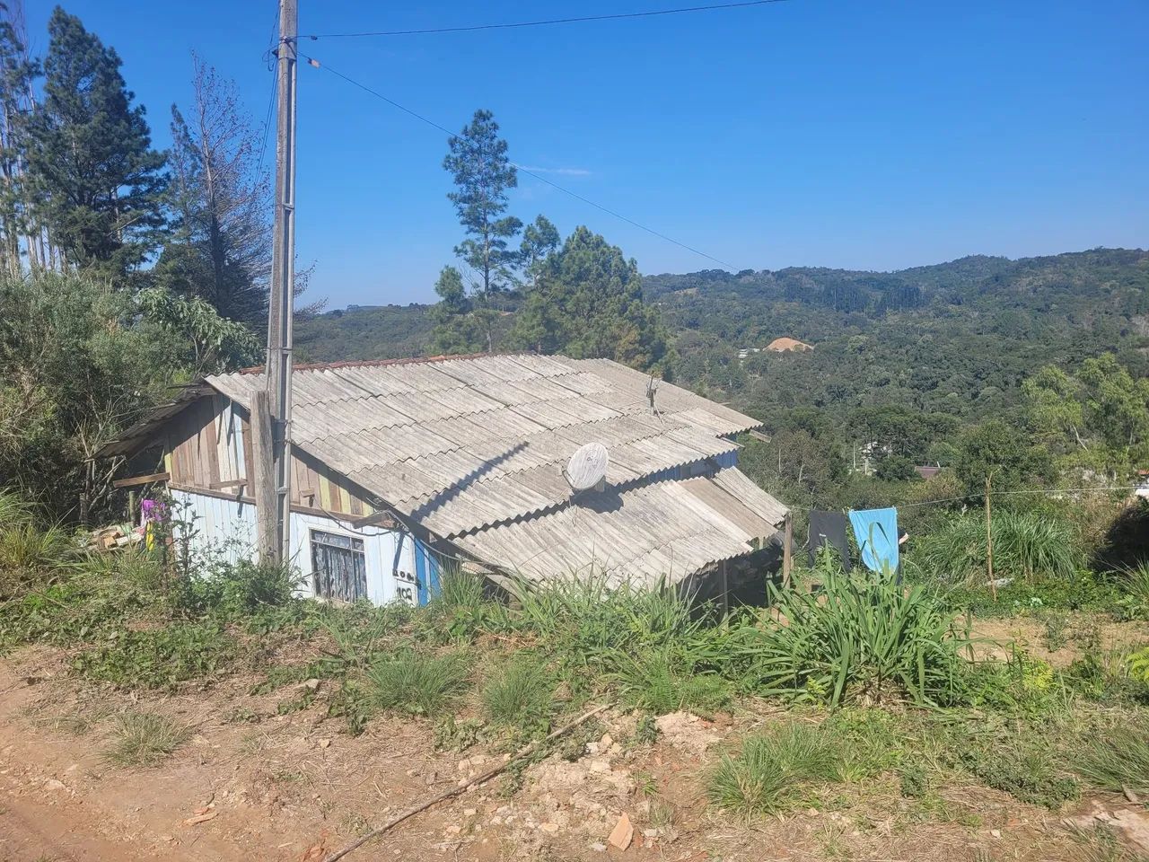 Vendo terreno com casa 