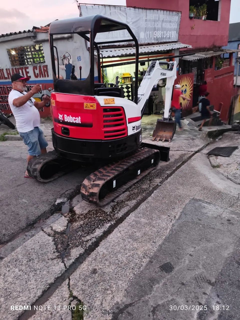Mine escavadeira e26 bob Cat 