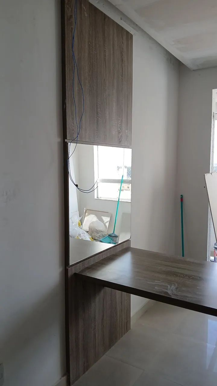 Panel with attached table and panel plus low cabinet with 03 drawers.64311791014531122