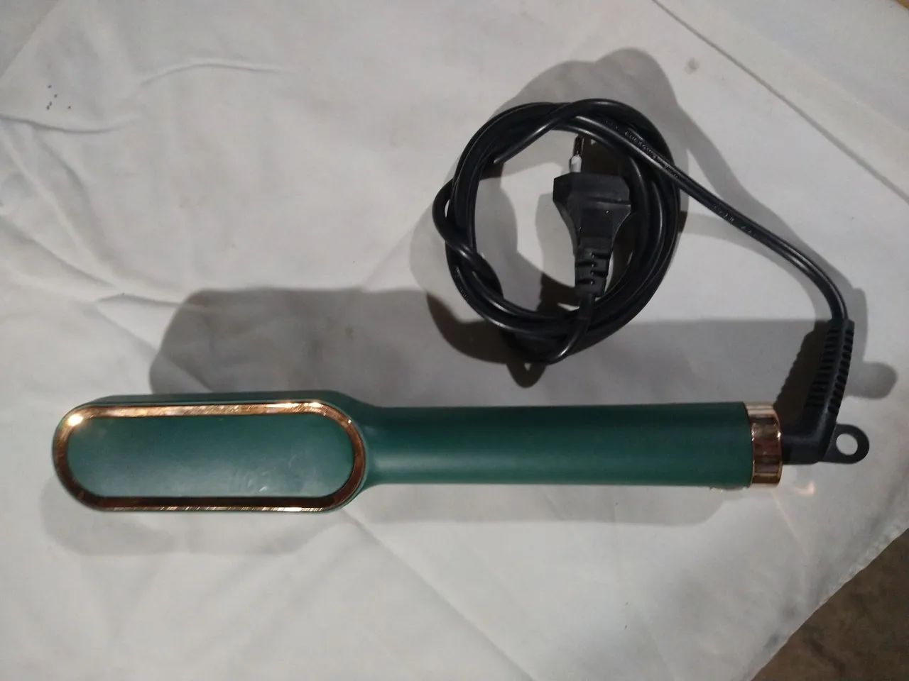 Escova alisadora com aquecimento bivolt. - Foto 2