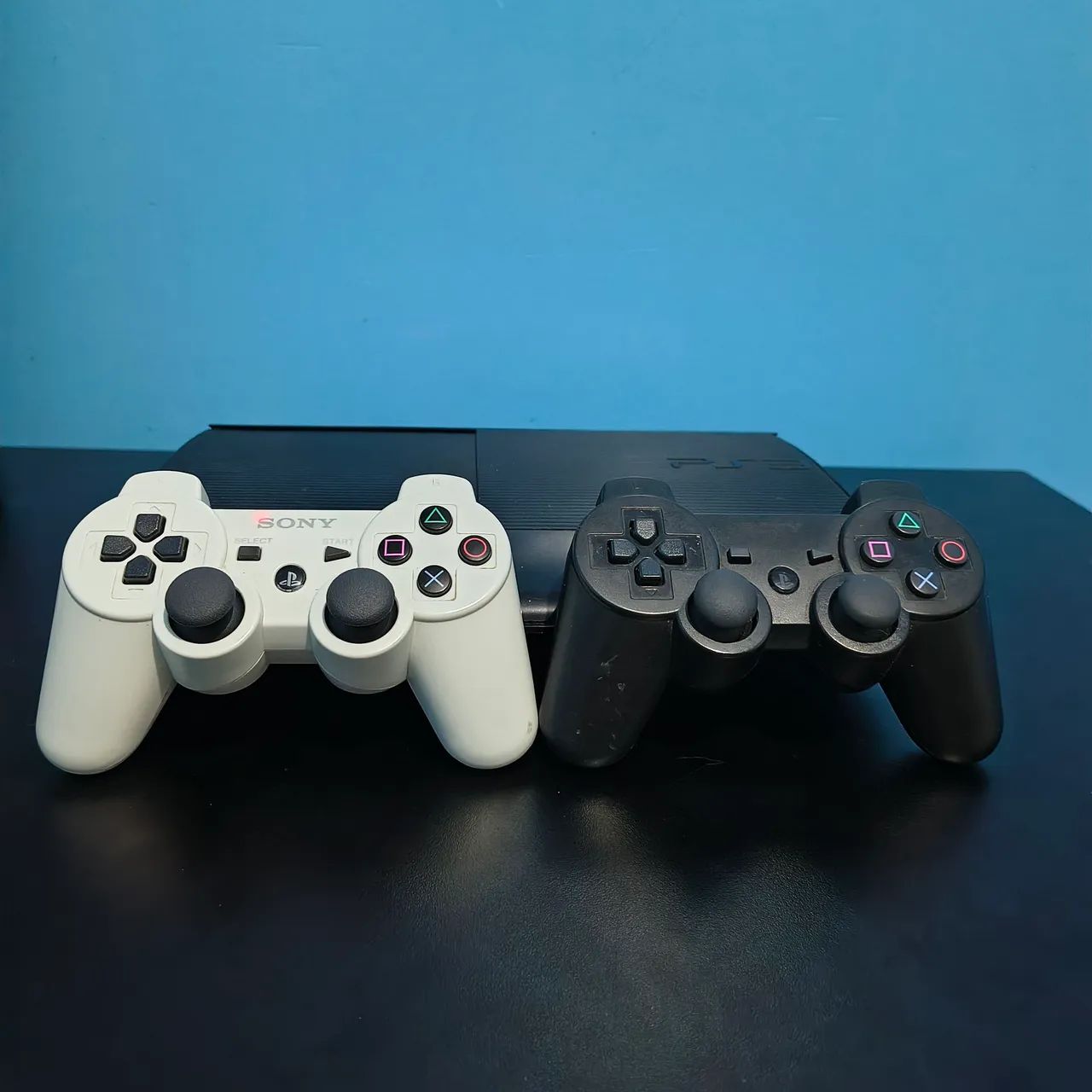 PS3 com dois controles e jogos - Foto 3