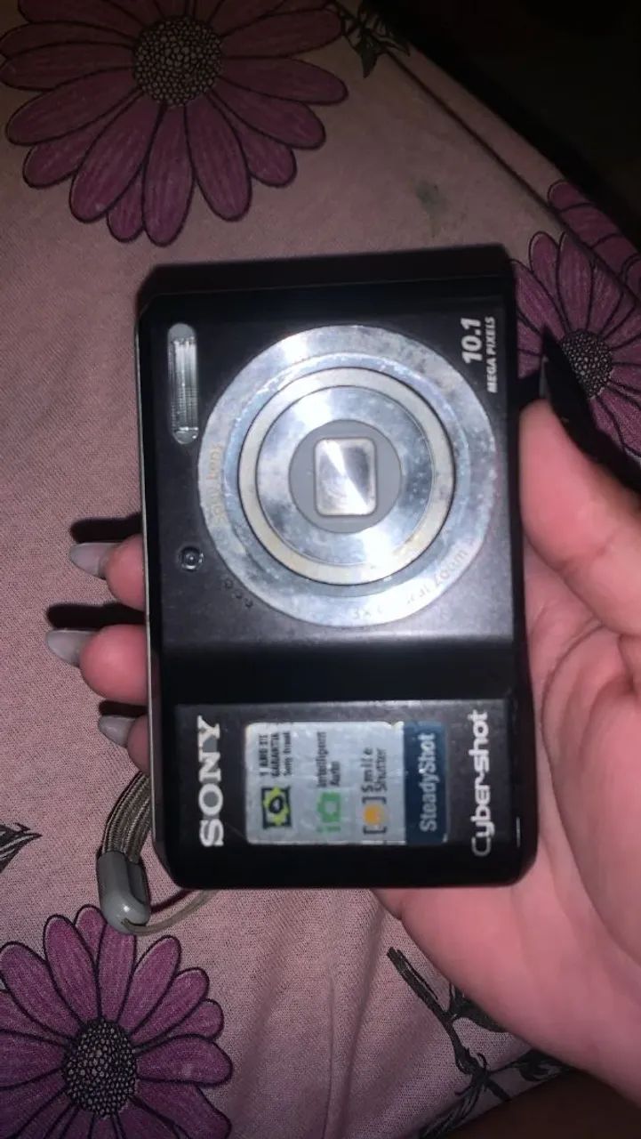 Vendo uma câmera em ótimo estado,super compacta 