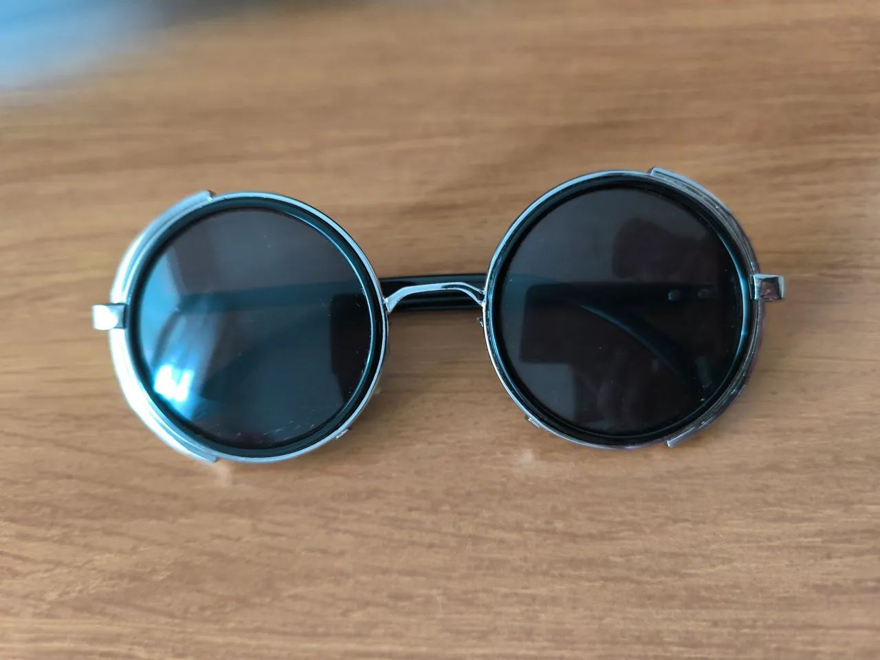 Óculos de sol redondo