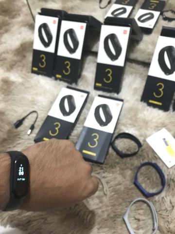 Promoção somente hoje Xiaomi mi band original + pulseira reserva + película - Foto 4