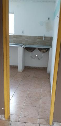 Casa muito ampla e arejada com garagem e 2 qts - Foto 7