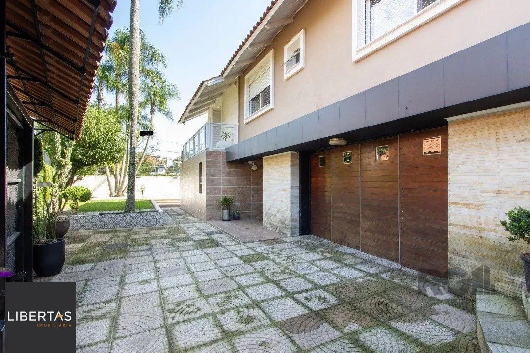 Casa a venda no bairro Guarujá com 4 dormitórios, piscina e salão de festas - Foto 5