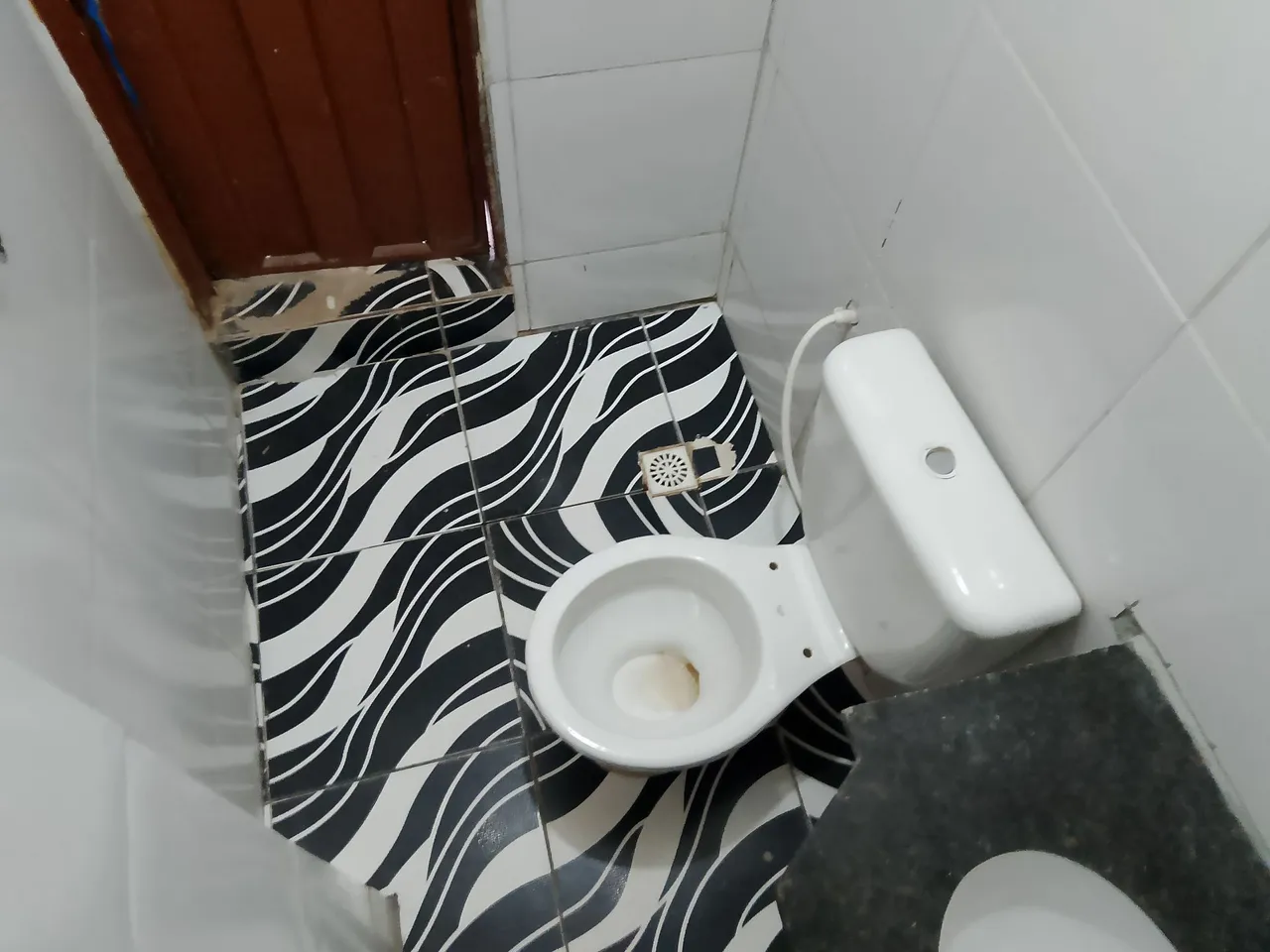 Aluga-se casa com 2 quartos,sala,cozinha,2 banheiro e garagem