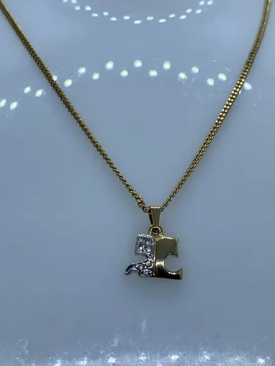 colar courreges logo dourado e pedras - Foto 3