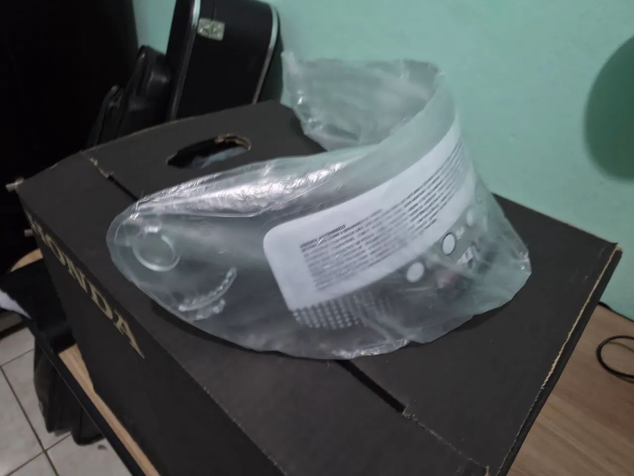 Viseira ORIGINAL para capacete Honda tam. 58 - Foto 3